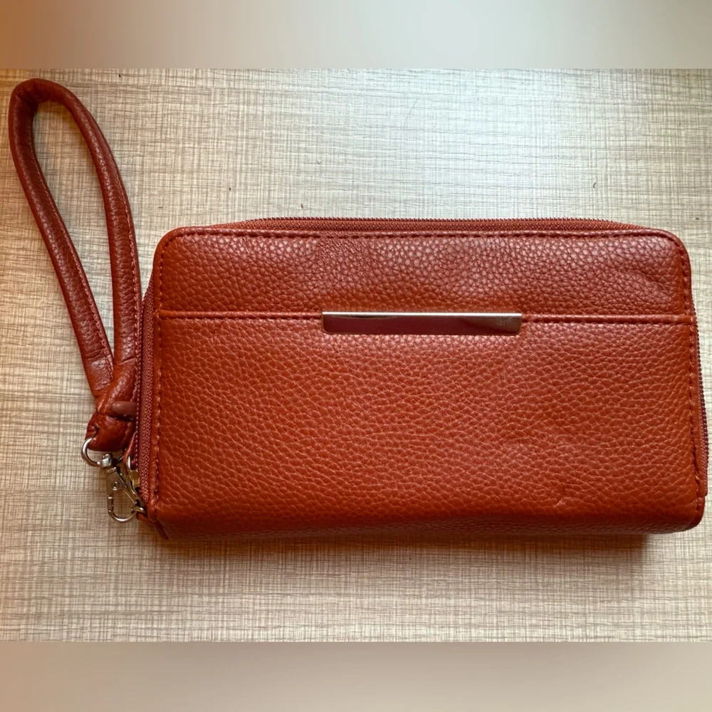 NWT Mundi Rust Clutch Wristlet